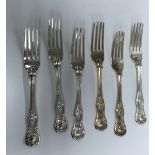 A set of six early Victorian silver "King's" pattern forks, bearing indistinct monogram "....