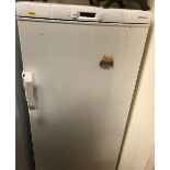 A John Lewis upright freezer, 60 cm wide x 60.