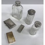 A silver Alfred Dunhill cigarette lighter (London 1954), 2.19 oz overall, 2.4 cm x 1.3 cm x 5.