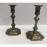 A pair of George V silver table candlesticks in the 18th Century manner (by Mappin & Webb,
