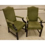A pair of modern upholstered Gainsborough style armchairs with swept arms on moulded supports