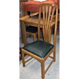 A set of eight Robin Furlong oak dining chairs with leather upholstered seats, stamped,