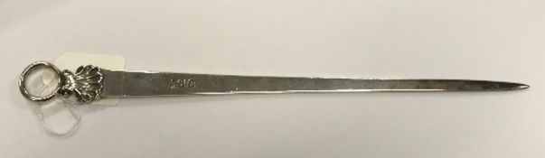 A George III silver meat skewer with shell and ring handle (London 1781), 3.