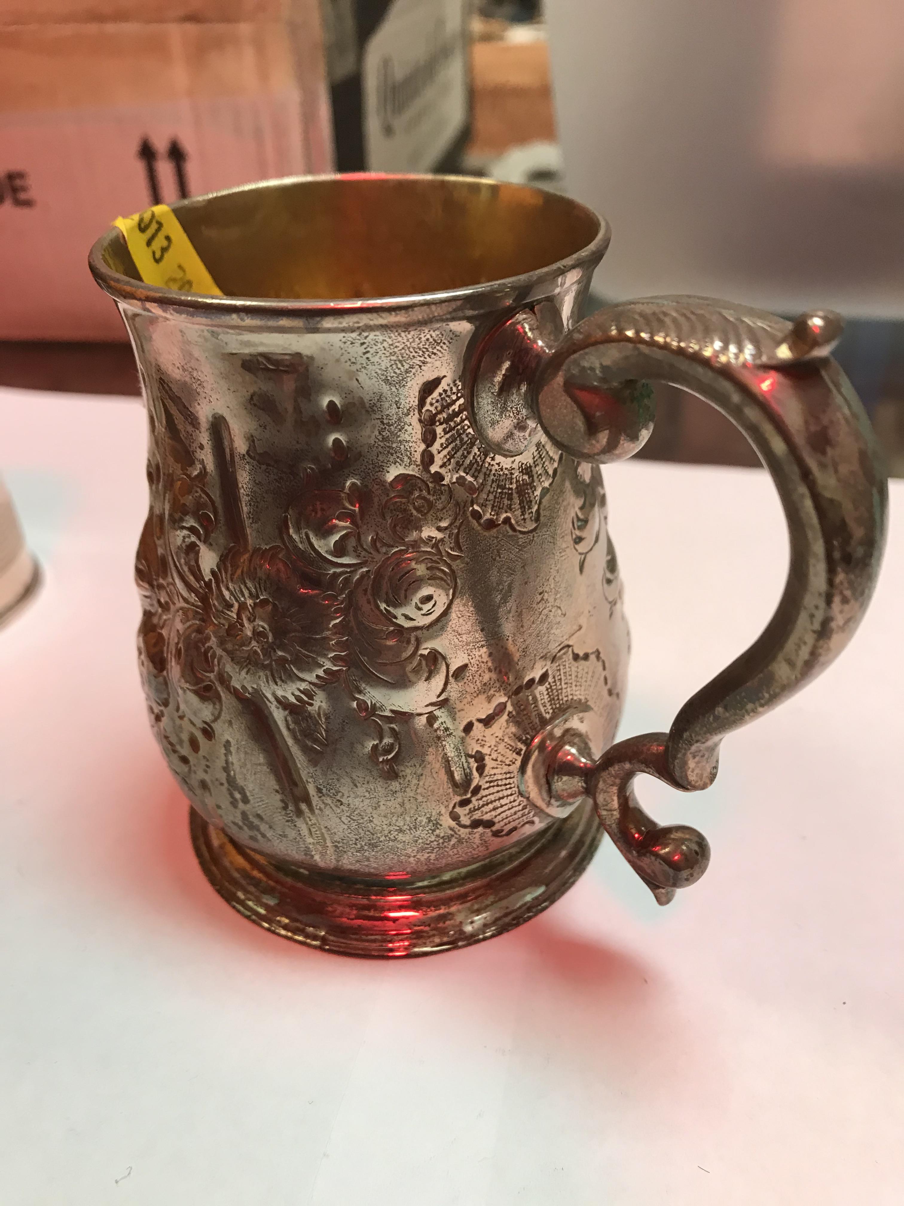 A George II silver baluster shaped mug with later foliate engraved decoration, - Image 22 of 42