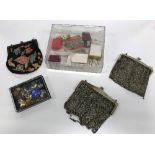 A box of various costume jewellery, commemorative thimbles, badges,