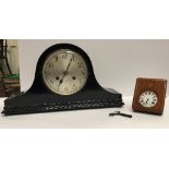 An early 20th Century ebonised dome top mantel clock with eight-day movement, 43.