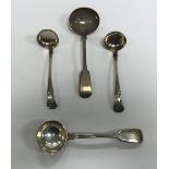 A pair of William IV Scottish silver "King's" pattern sauce ladles,