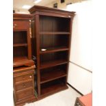 A modern mahogany side unit, the plain top above two drawers above two enclosed shelves,