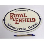 A modern painted cast metal sign "Royal Enfield",