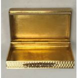 A 20th Century 9 carat gold pill or snuff box with engine-turned decoration of rectangular form (by