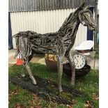 A wooden figural horse sculpture,