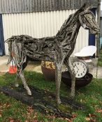A wooden figural horse sculpture,