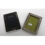 An Edwardian rectangular silver photograph frame on easel mount (maker's mark obscured,