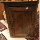 A 19th Century oak corner cupboard with single drawer,