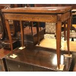 An early 19th Century rosewood and cross-banded fold-over card table on square tapered splayed