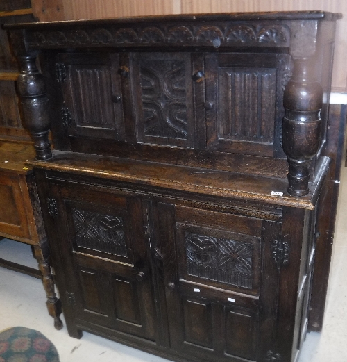 A Victorian oak court cupboard with carved decoration in the 17th Century manner,