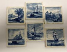 A collection of six small Delft tiles depicting seascapes and landscapes, 7.5 cm x 7.