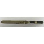 A 19th Century Chinese paperknife with jade and white metal banded handle and white metal blade,