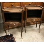 A pair of 20th Century mahogany bedside tables in the Louis XV manner,