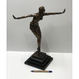 A modern cast bronze figure in the Art Deco taste, inscribed "Bronze Garnti Paris J.