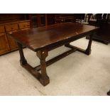 A 20th Century oak refectory style dining table,