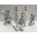 A collection of five Hungarian hand-painted porcelain figures of nudes by Aquincum of Budapest,