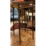 An Edwardian mahogany and inlaid plant stand in the Georgian style with galleried top over a
