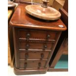 A 19th Century mahogany slim chest of drawers, the plain top above four short drawers,