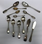 A set of four Victorian "Fiddle" pattern teaspoons, a pair of engraved and embossed fruit teaspoons,