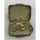 A Victorian silver vinaigrette of rectangular form with foliate engraved decoration,