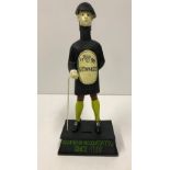 A modern painted cast iron advertising figure inscribed "Guiness Good for Him Good for You since