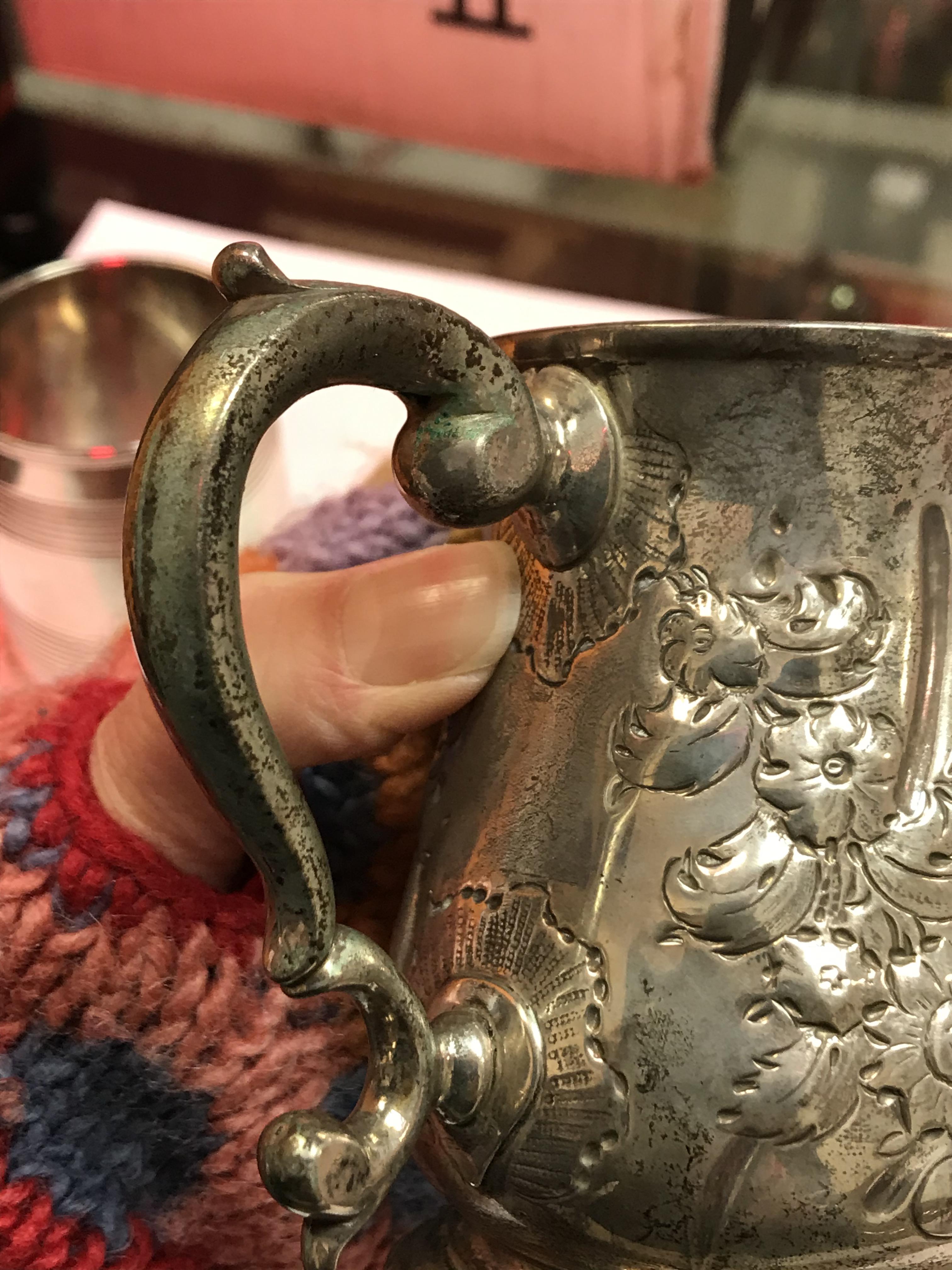 A George II silver baluster shaped mug with later foliate engraved decoration, - Image 25 of 42