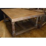 An oak coffee table in the Arts & Crafts manner, 126 cm wide x 85.5 cm deep x 45.