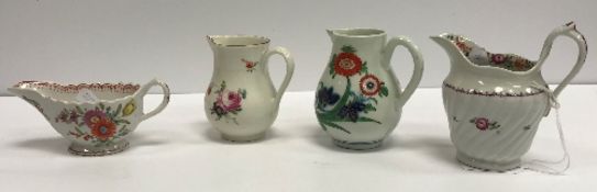 A 19th Century Chelsea type sparrow beak jug with floral decoration, 8 cm high,