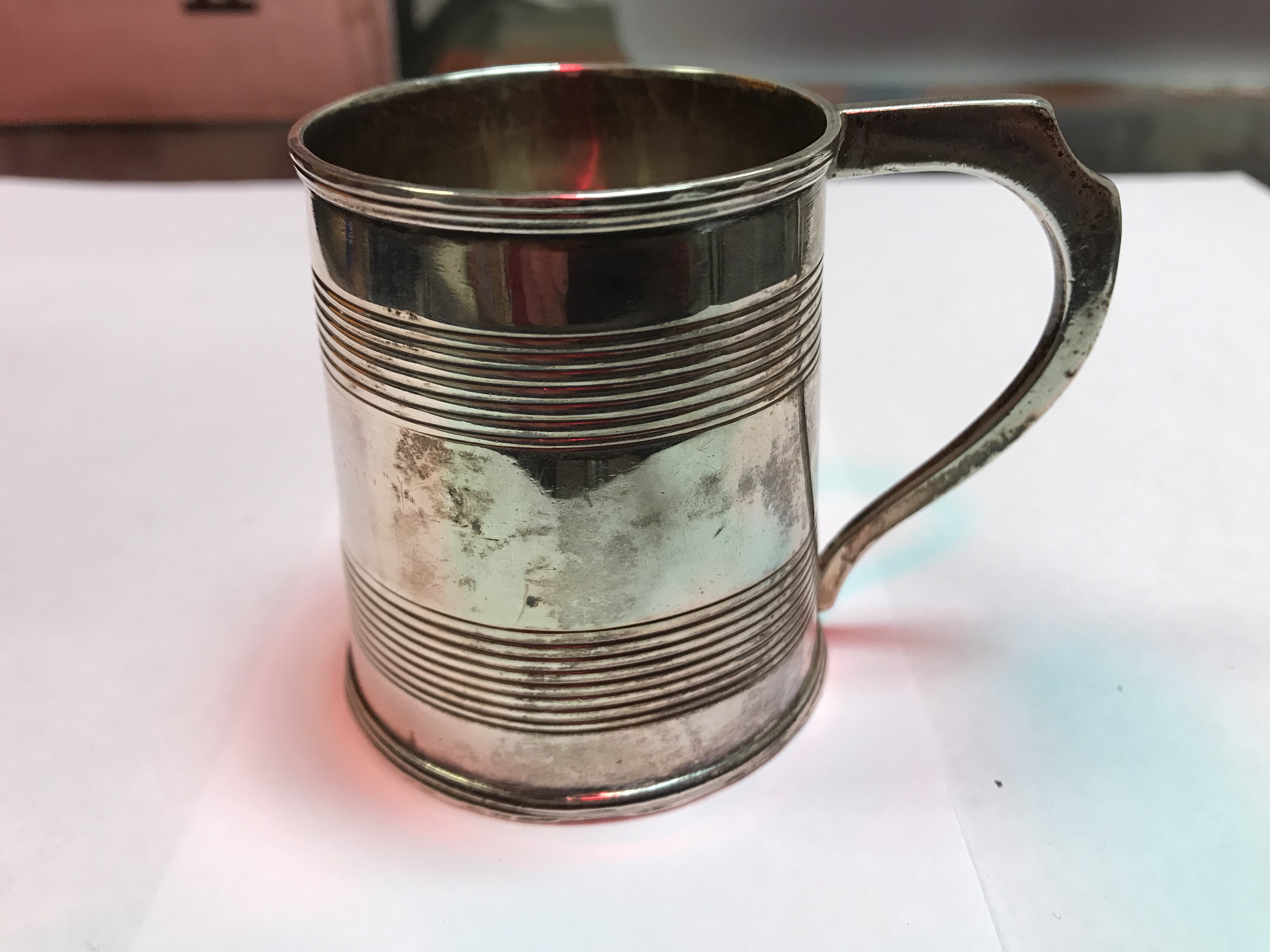 A George II silver baluster shaped mug with later foliate engraved decoration, - Image 35 of 42