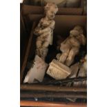 Two boxes of sundry items to include plaster of Paris statues, various walking sticks,