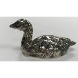 A Victorian silver novelty pepper as a seated or swimming goose (by James Barclay Hennell,