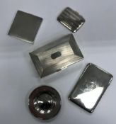 Three various cigarette cases (various dates and makers), a modern silver alms dish, 14.