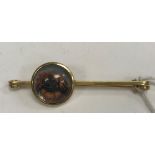 An un-marked yellow metal mounted Essex crystal brooch as a Pekinese,