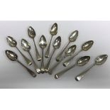 A set of six George III silver dessert spoons "Old English" pattern (by Solomon Hougham,