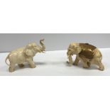 A 19th Century Japanese Meiji period carved figure of a bull elephant, signed to foot,