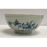 An 18th Century Worcester cabbage leaf design bowl with blue floral spray decoration,