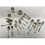 A collection of various small silver wares to include thirteen various spoons, engraved vesta case,