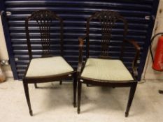 A set of eight 19th Century mahogany dining chairs in the Hepplewhite manner,