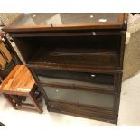 A Globe Wernicke oak three section bookcase, 86 cm wide x 30.