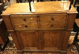 A Victorian oak secretaire collector's cabinet, the breakfront top with moulded edge,