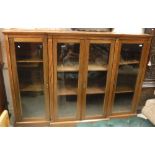 A circa 1900 mahogany breakfront glazed bookcase with adjustable shelves, 213.