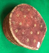 A leather coller box of horse shoe form containing assorted hunt buttons etc together with a ladies