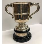 A George V silver two-handled trophy cup of inverted bell form,