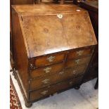 An 18th Century walnut bureau,